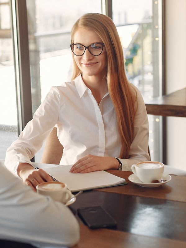 A woman wearing a smart shirt