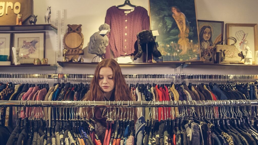 A young woman browses for organic clothes