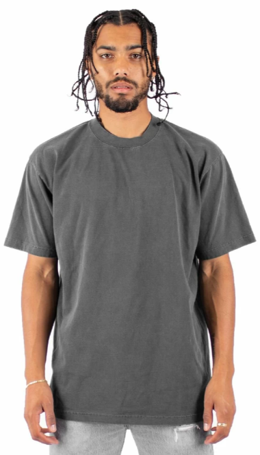 A man models a grey t-shirt from Shaka Wear