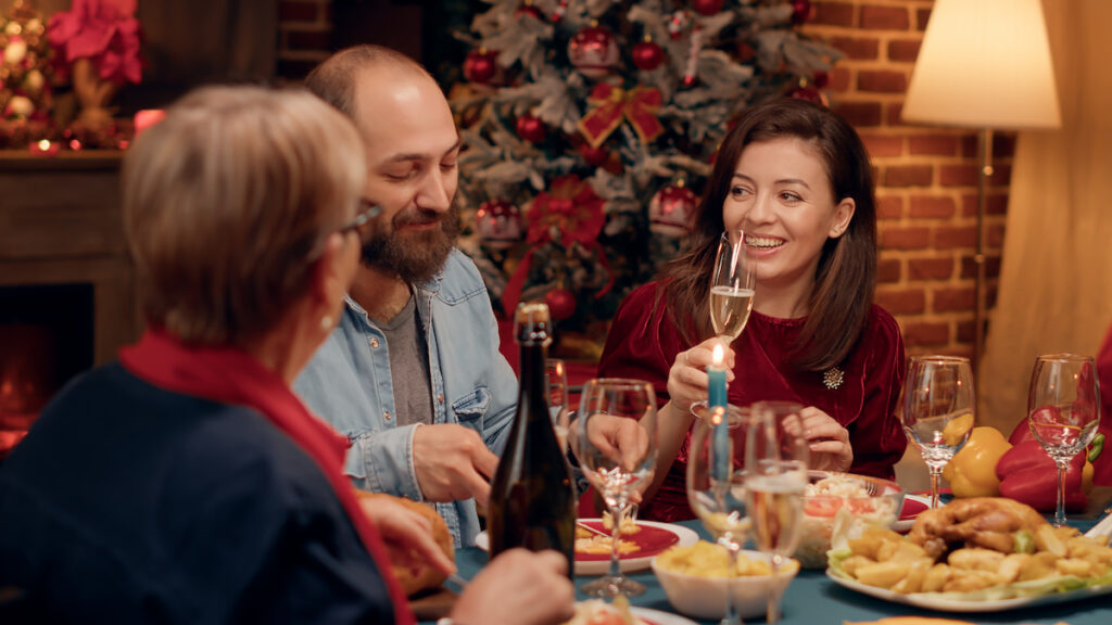 Some loved ones eating Christmas dinner together